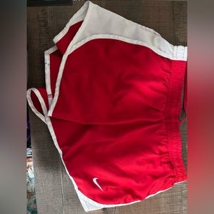red nike running shorts
